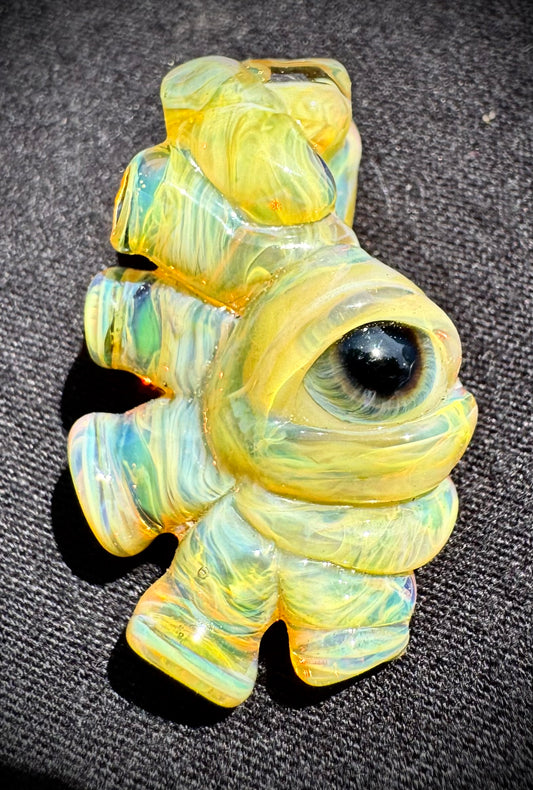 Sculpted eye pendant
